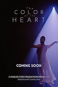 Poster for The Color of the Heart - we see a woman dancing with joy as artistic lighting shining on her